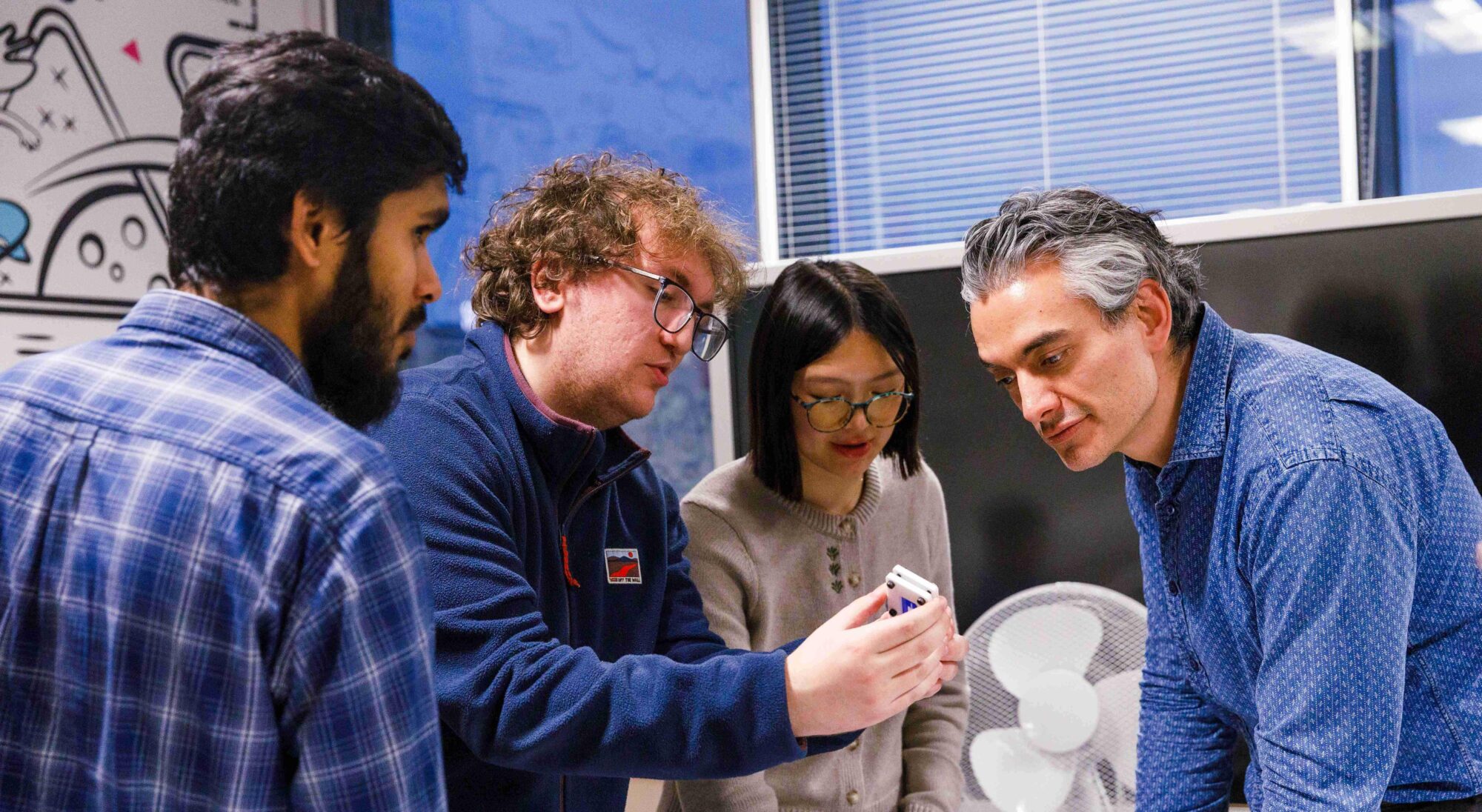 Multus Media team working in the lab